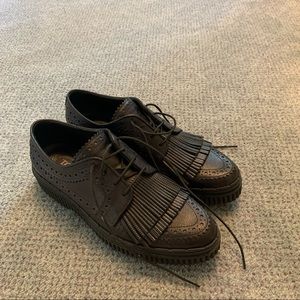 Tod’s Black Leather Oxford Shoes